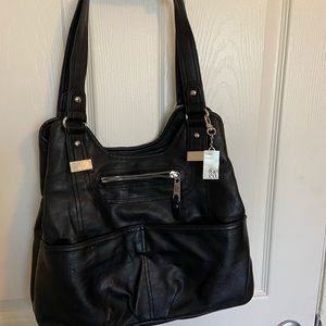 This purse has a lot of compartments by S&CO.